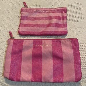 Two pink small travel bags